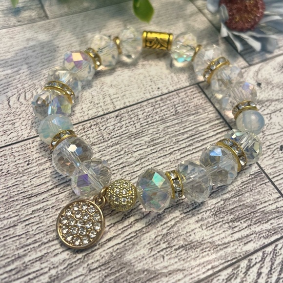 Charmed Clear Crystal 12/14mm with charm, gold  and cz accents - Picture 2 of 5